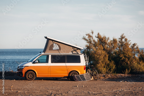 Motor home parked at beach camper van prepared for a long term parking