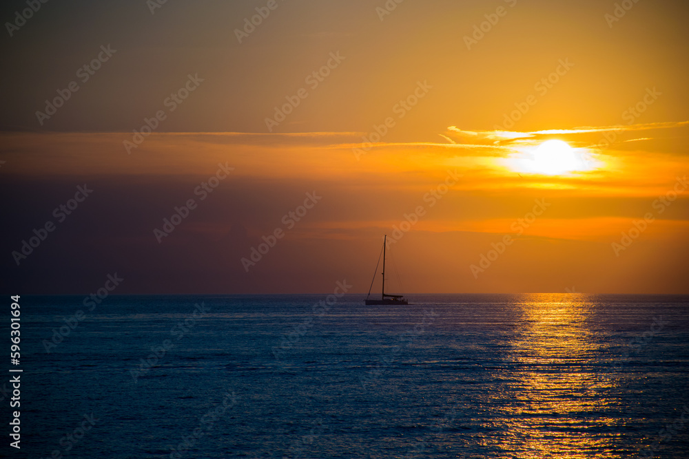 Sunset on the Ocean with a Sailboat, in Umag, Croatia