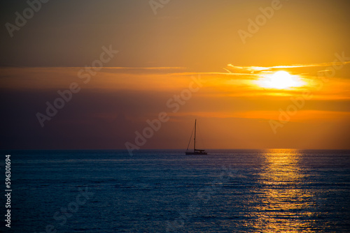 Sunset on the Ocean with a Sailboat, in Umag, Croatia