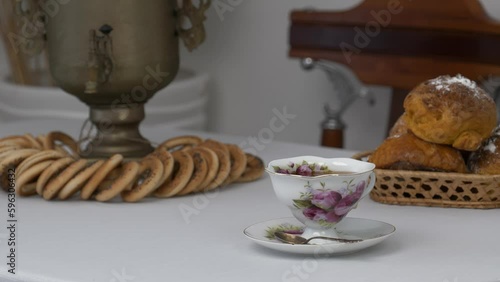 Cup of tea with delicious ring shaped Sushki (dry bagels) on a table 