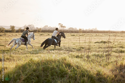 You go at your own pace. Shot of two young women out horseback riding together.