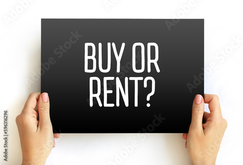 Buy or Rent? text on card, concept background