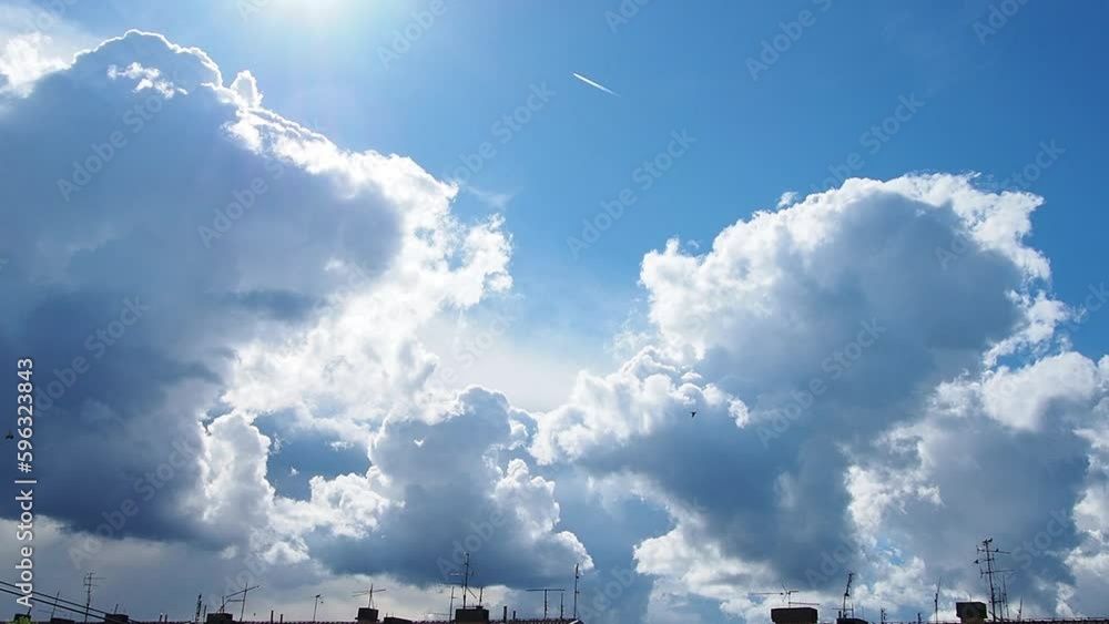 Very beautiful blue sky with clouds above the roof of the house with ...