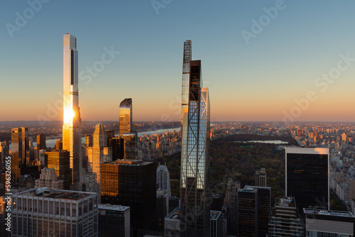 Aerial view of supertall buildings and skyscrapers of Billionaires Row in Midtown Manhattan at sunset. New York City photo