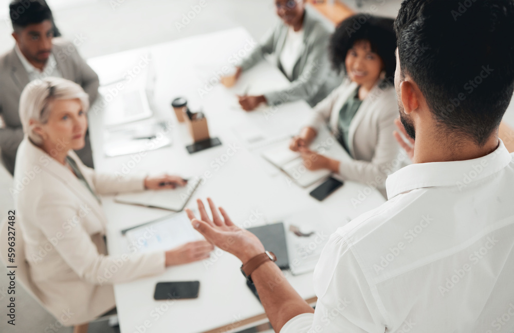 This is the situation. Shot of a group of businesspeople in a meeting at work.