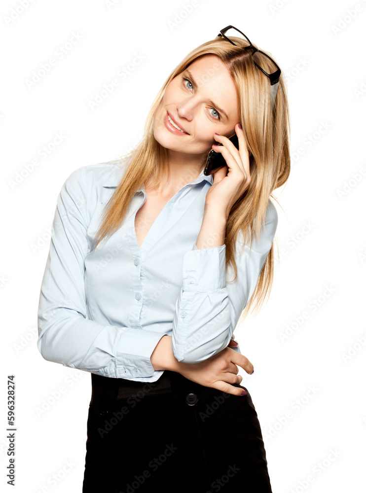Business happens no matter where I am. Shot of a young businesswoman using a smartphone against a studio background. Business happens no matter where I am. Shot of a young businesswoman using a smartphone against a studio background.