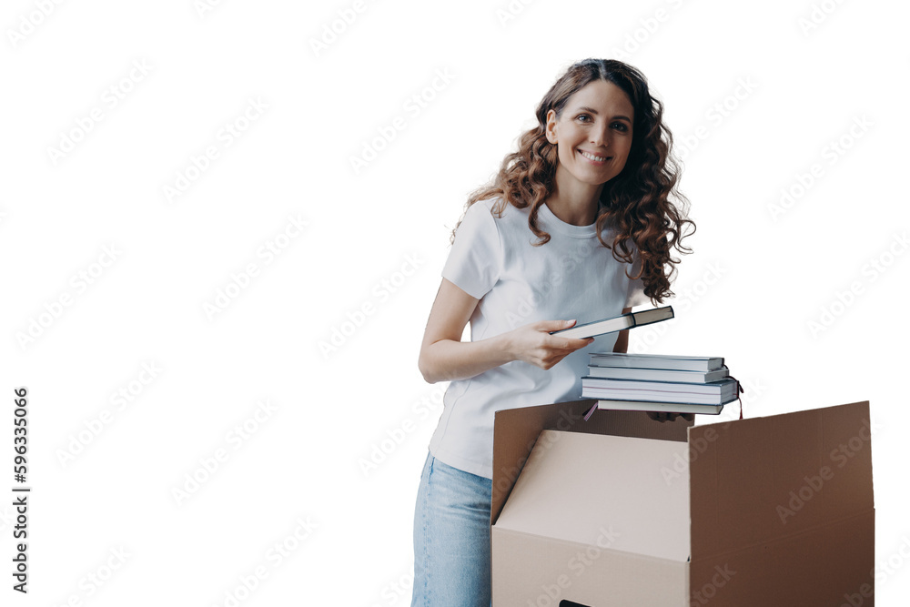 Happy female homeowner unpacking box with things during moving. Relocation in new house, mortgage Happy female homeowner unpacking box with things during moving. Relocation in new house, mortgage