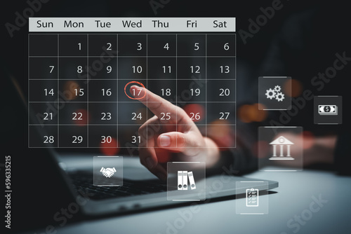 Calender Planner Organization Management Remind Concept,Person using calendar on computer to improve time management, plan appointments, events, tasks and meetings efficiently, improve productivity.