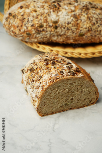Fresh bread with oatmeal flakes and sunflower