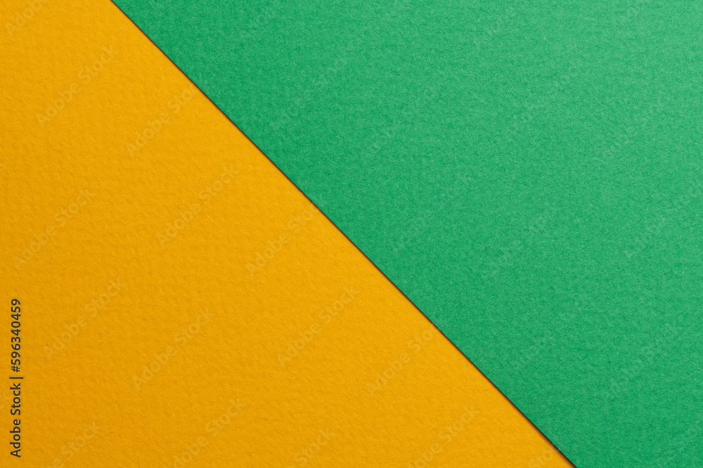 Rough kraft paper background, paper texture orange green colors. Mockup with copy space for text Rough kraft paper background, paper texture orange green colors. Mockup with copy space for text