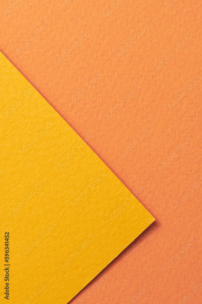 Rough kraft paper background, paper texture orange yellow colors. Mockup with copy space for text Rough kraft paper background, paper texture orange yellow colors. Mockup with copy space for text