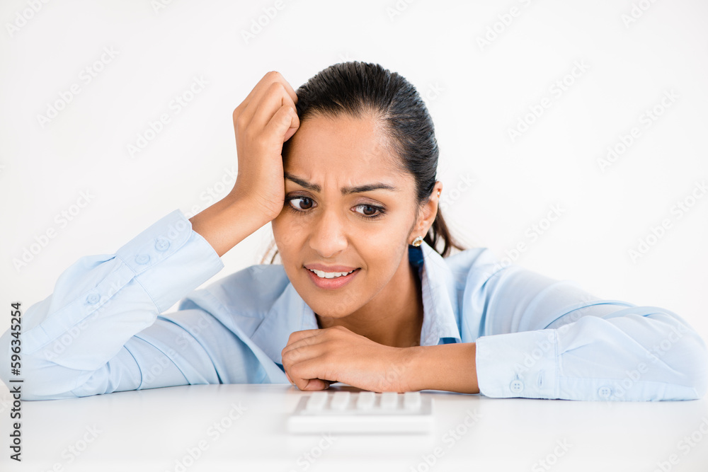 My head might explode. Shot of a young businesswoman looking stressed. My head might explode. Shot of a young businesswoman looking stressed.