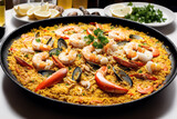 Paella, traditional spanish dish made with rice, Chicken and vegetables, served in a pan. Paella with seafood. Spanish cuisine. Generative AI