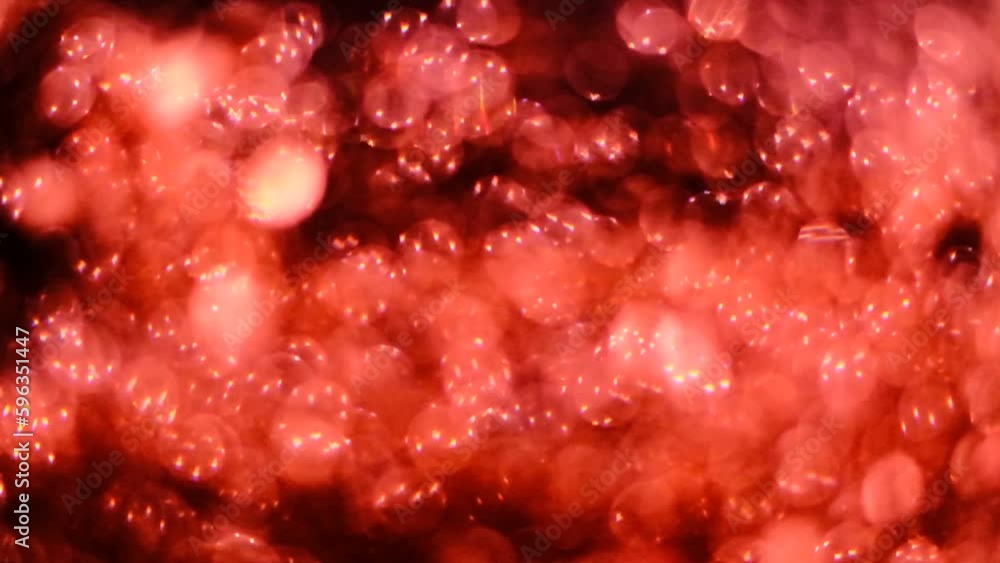 slow motion of abstract sparkle on black background. Beautiful transition with real particles. flying in wind on black background, shot with depth of field. slow motion of abstract sparkle on black background. Beautiful transition with real particles. flying in wind on black background, shot with depth of field.