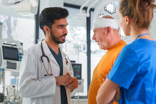 Young doctor and nurse consulting health condition with senior man.