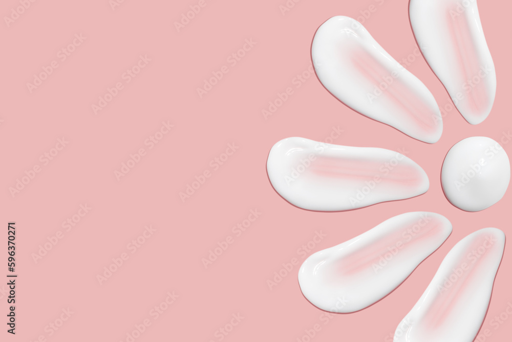 Lots of smears of cosmetic cream. Light, smooth surface. Texture of spreadable cream. Liquid creamy strokes. On a pink background. Cosmetic background, banner. Lots of smears of cosmetic cream. Light, smooth surface. Texture of spreadable cream. Liquid creamy strokes. On a pink background. Cosmetic background, banner.