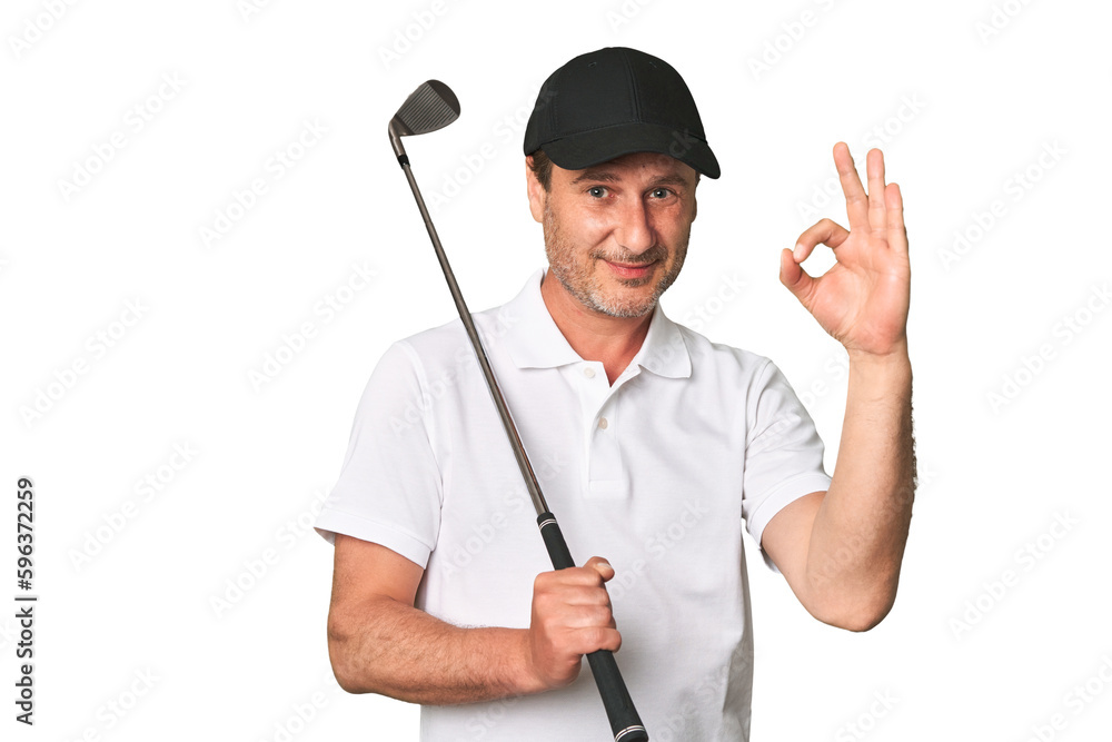Middle aged golfer man cheerful and confident showing ok gesture. Middle aged golfer man cheerful and confident showing ok gesture.