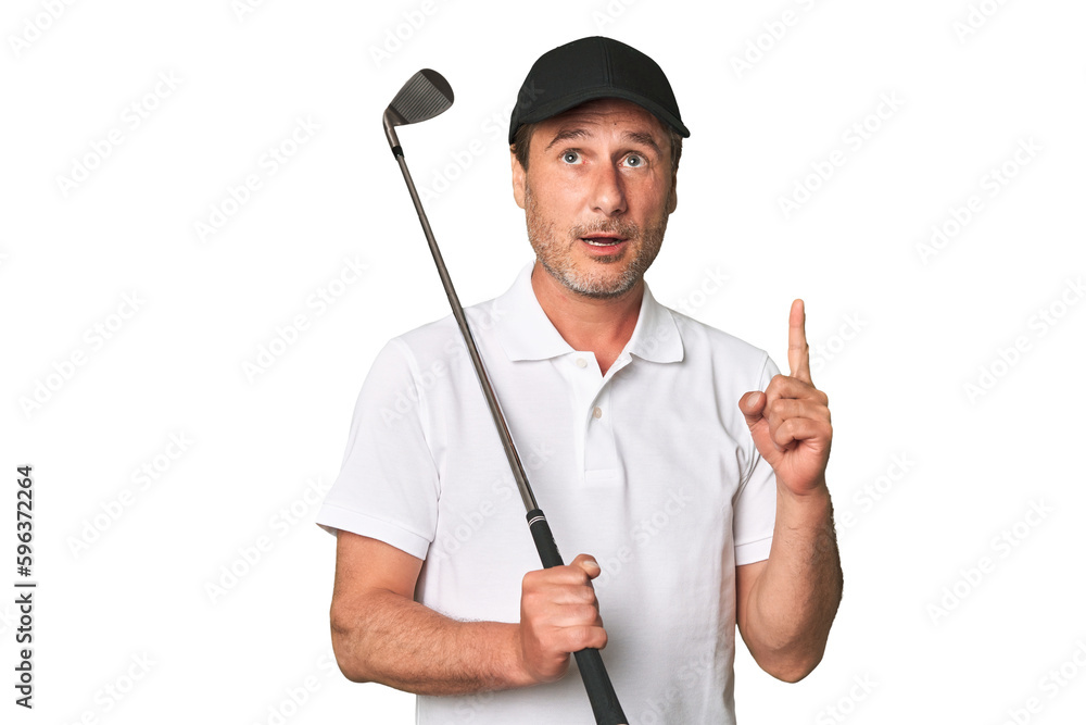 Middle aged golfer man pointing upside with opened mouth.