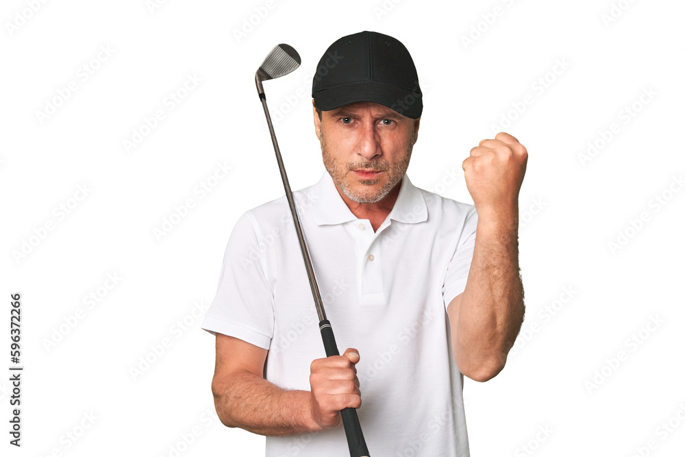 Middle aged golfer man showing fist to camera, aggressive facial expression. Middle aged golfer man showing fist to camera, aggressive facial expression.
