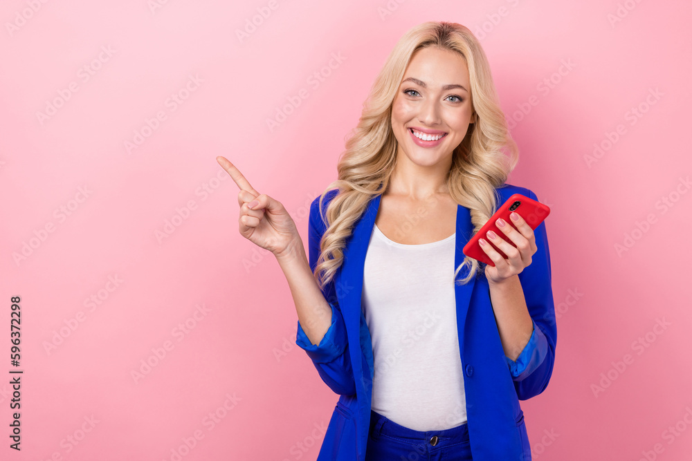 Portrait of entrepreneur young business lady wear blue blazer red smartphone recommend finger mockup apple gadget isolated on pink color background Portrait of entrepreneur young business lady wear blue blazer red smartphone recommend finger mockup apple gadget isolated on pink color background