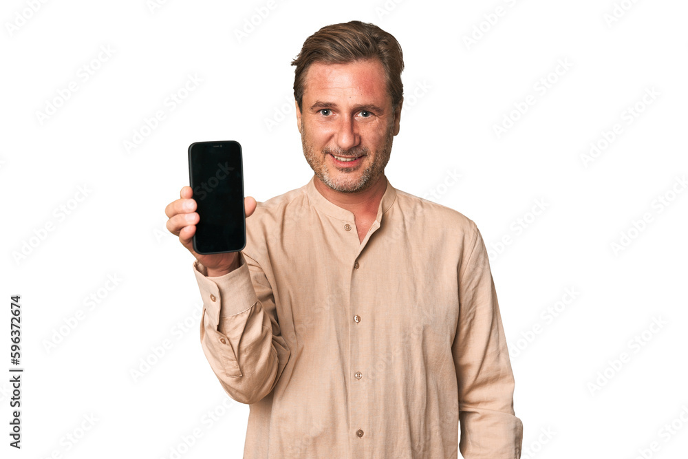 A middle-aged man showing the display of his phone to promote something A middle-aged man showing the display of his phone to promote something