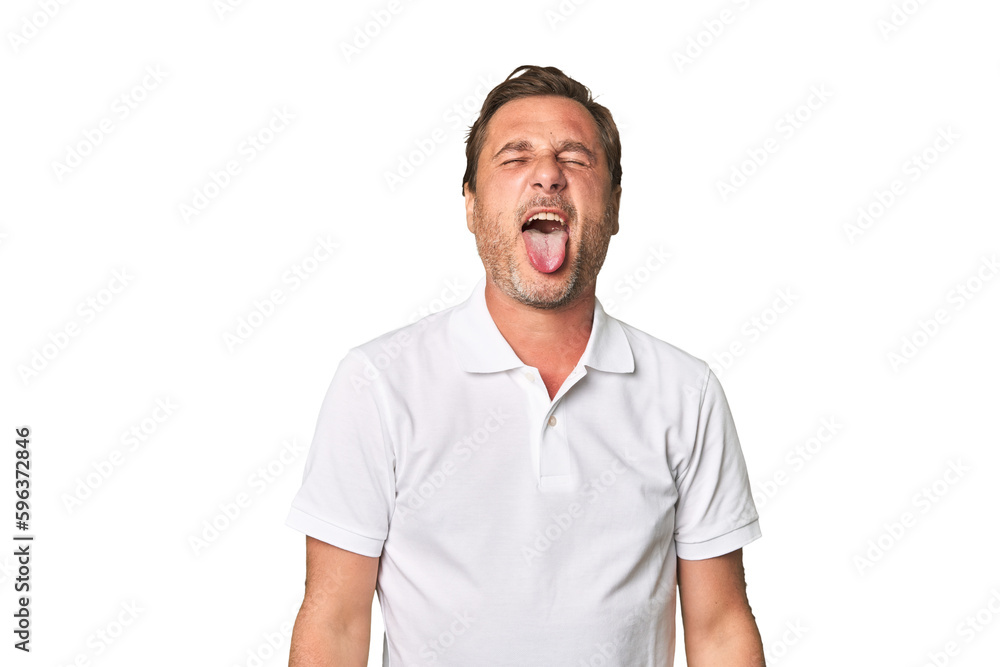 A middle-aged man isolated funny and friendly sticking out tongue. A middle-aged man isolated funny and friendly sticking out tongue.