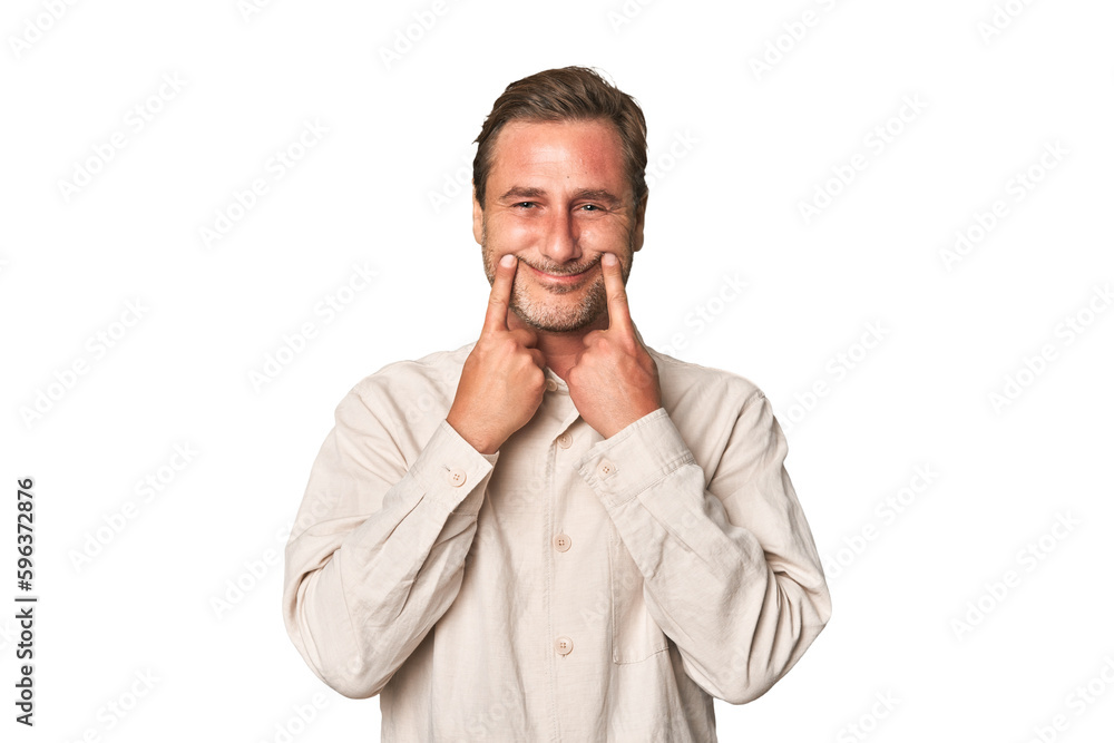 A middle-aged man isolated doubting between two options. A middle-aged man isolated doubting between two options.