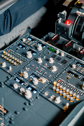 Detailed shot of the cockpit of the passenger plane the control panel of the plane flight simulator