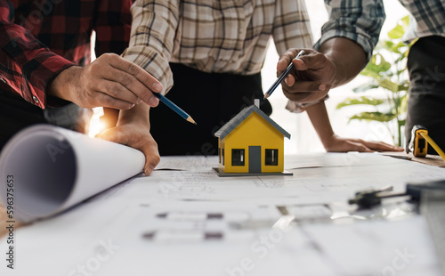 close up view of business people having consultation about wind energy at company office.