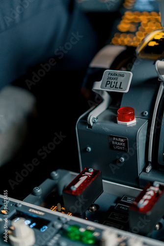 close-up of the control panel in the cockpit of the airplane the parking brake button flight simulator