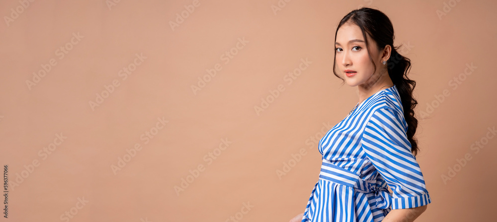 cheerful asian female woman stylish glamorous costume dress summertime carefree freshness portrait studio shot on brown colour background,asia woman smiling confident standing pose blue strip cloth cheerful asian female woman stylish glamorous costume dress summertime carefree freshness portrait studio shot on brown colour background,asia woman smiling confident standing pose blue strip cloth
