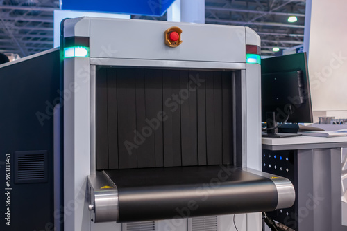 фотографія Automatic shrinking film wraping packaging machine at plastic exhibition, trade