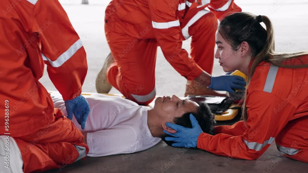Group of Asian emergency medical technician (EMT) or paramedic team is