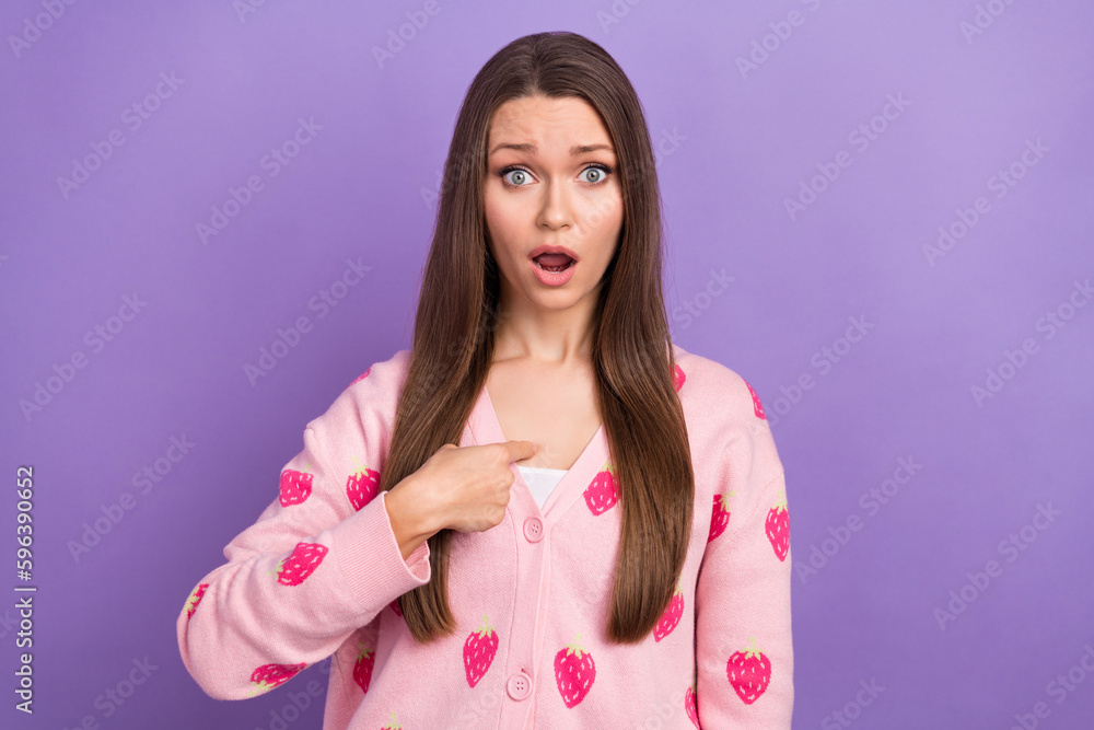 Photo of impressed shocked girl wear berry print cardigan pointing finger herself isolated violet color background Photo of impressed shocked girl wear berry print cardigan pointing finger herself isolated violet color background