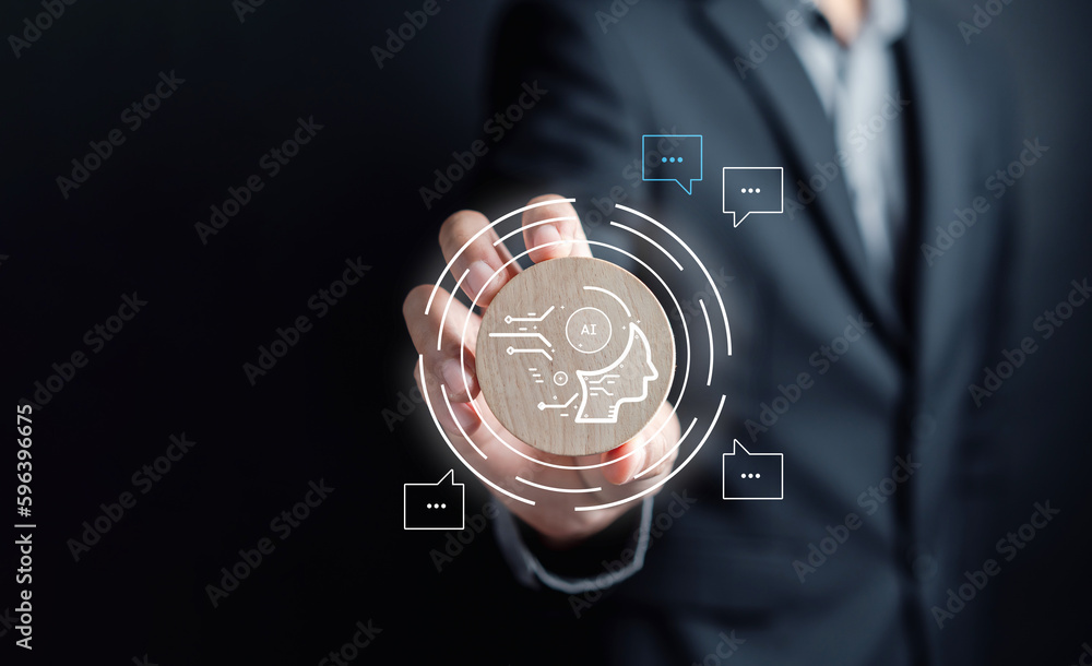 Ai Technology System. Businessman holding wooden block with chat bot intelligence Ai icon. Chat with AI Artificial Intelligence, developed by OpenAI generate. Futuristic technology, robot in online. Ai Technology System. Businessman holding wooden block with chat bot intelligence Ai icon. Chat with AI Artificial Intelligence, developed by OpenAI generate. Futuristic technology, robot in online.