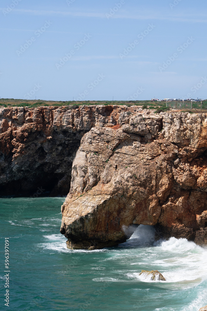 landscape view of the atlantic ocean and caves and cliffs in Sagres Algarve Portugal 