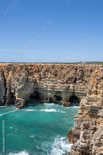 landscape view of the atlantic ocean and caves and cliffs in Sagres Algarve Portugal 