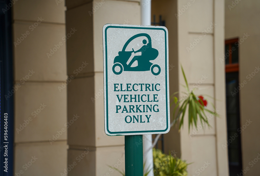 electric vehicle parking only sign Stock Photo | Adobe Stock