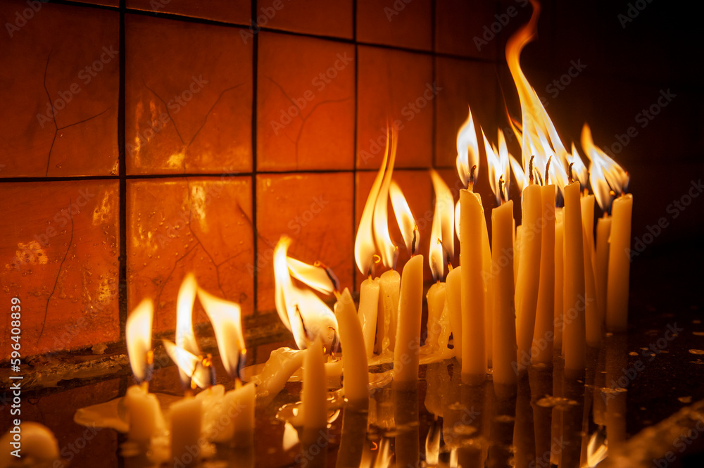 burning candles in the church