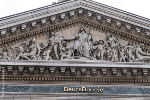 Architectural fragment of Brussels Stock Exchange building (BeursBourse) on the Place de la Bourse. The building erected from 1868 to 1873 in the Neo-Renaissance style. Brussels, Belgium.
