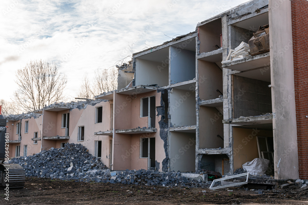 Demolition of low-rise residential building. Reconstruction, restoring damaged building. Destroyed house. Demolition of low-rise residential building. Reconstruction, restoring damaged building. Destroyed house.