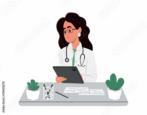 Online medical consultation on a digital tablet. Smiling female doctor wearing white uniform holding tablet pc.