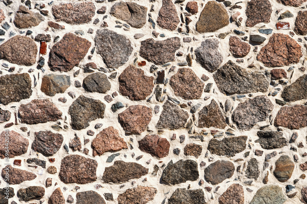 Stonework Stonework. Wall texture from rustic cobble stones various shape ...