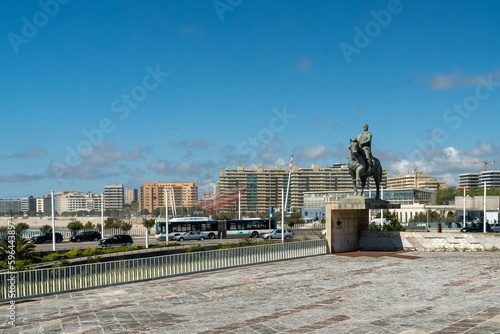 Oporto, Portugal. April 13 , 2022: Equestrian statue of D. Joao VI with blue sky.