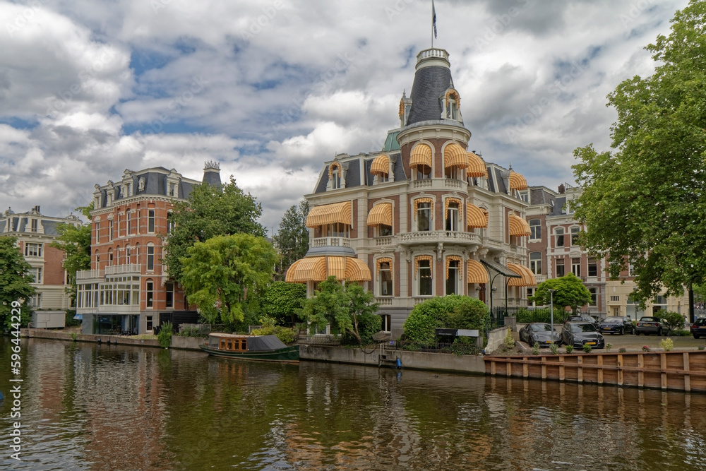 Amsterdam, the Netherlands - view of the old town from the water canal Amsterdam, the Netherlands - view of the old town from the water canal