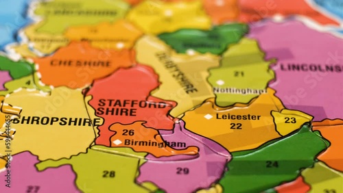 United Kingdom Puzzle Map with English Cities Leicester, Norwich, Birmingham. Close-Up Video Background, Dolly Footage. Selective Focus. Camera Moves From Left to Right.