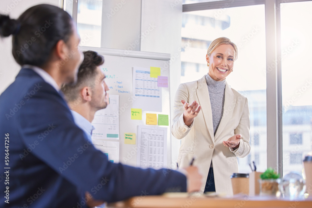 She encourages her team to provide as much input. Shot of a mature businesswoman having a meeting with her colleagues in an office. She encourages her team to provide as much input. Shot of a mature businesswoman having a meeting with her colleagues in an office.