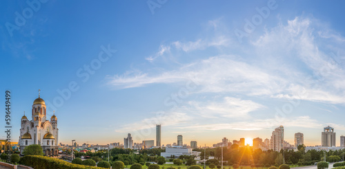 Panorama of spring or summer Yekaterinburg and Temple on Blood in orange sunset light. Yekaterinburg, Russia