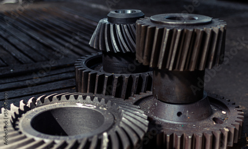 Spur, helical and bevel gears construction and production. Rusted metal
