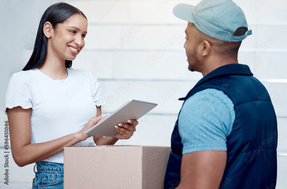 Thank you for getting this to me so quickly. Shot of a young woman using a digital tablet to sign for her delivery from the courier. Thank you for getting this to me so quickly. Shot of a young woman using a digital tablet to sign for her delivery from the courier.